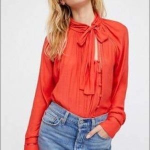 Free people orange neck tie blouse size XS